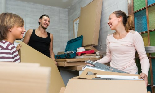 Removal van and moving boxes prepared for a house move in Belsize Park