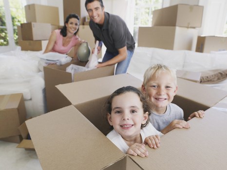 Professional movers loading boxes for a Belsize Park home relocation