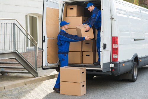 Preparing furniture and boxes for removal truck hire in Belsize Park