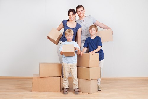 Checklist and packed boxes ready for a commercial move in Belsize Park