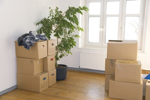 Furniture and boxes being loaded into a moving van in North London