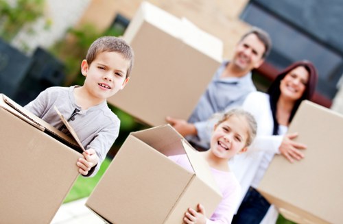 Local movers loading boxes and household items in Belsize Park