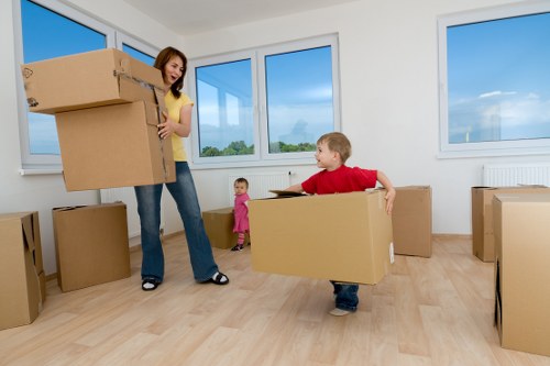 Careful wrapping of fragile household items for packing and unpacking services