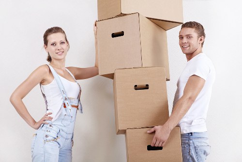 Furniture and boxes being loaded onto a moving truck