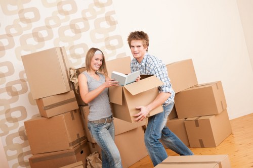 Boxes and furniture arranged in a new flat after a successful Belsize Park removal