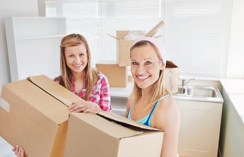 Organised moving day in Belsize Park with furniture and boxes