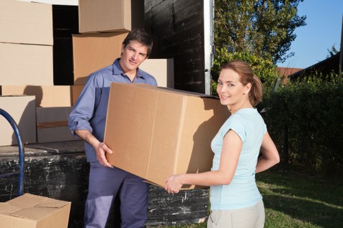 A small business office move near Belsize Park with labelled boxes and furniture